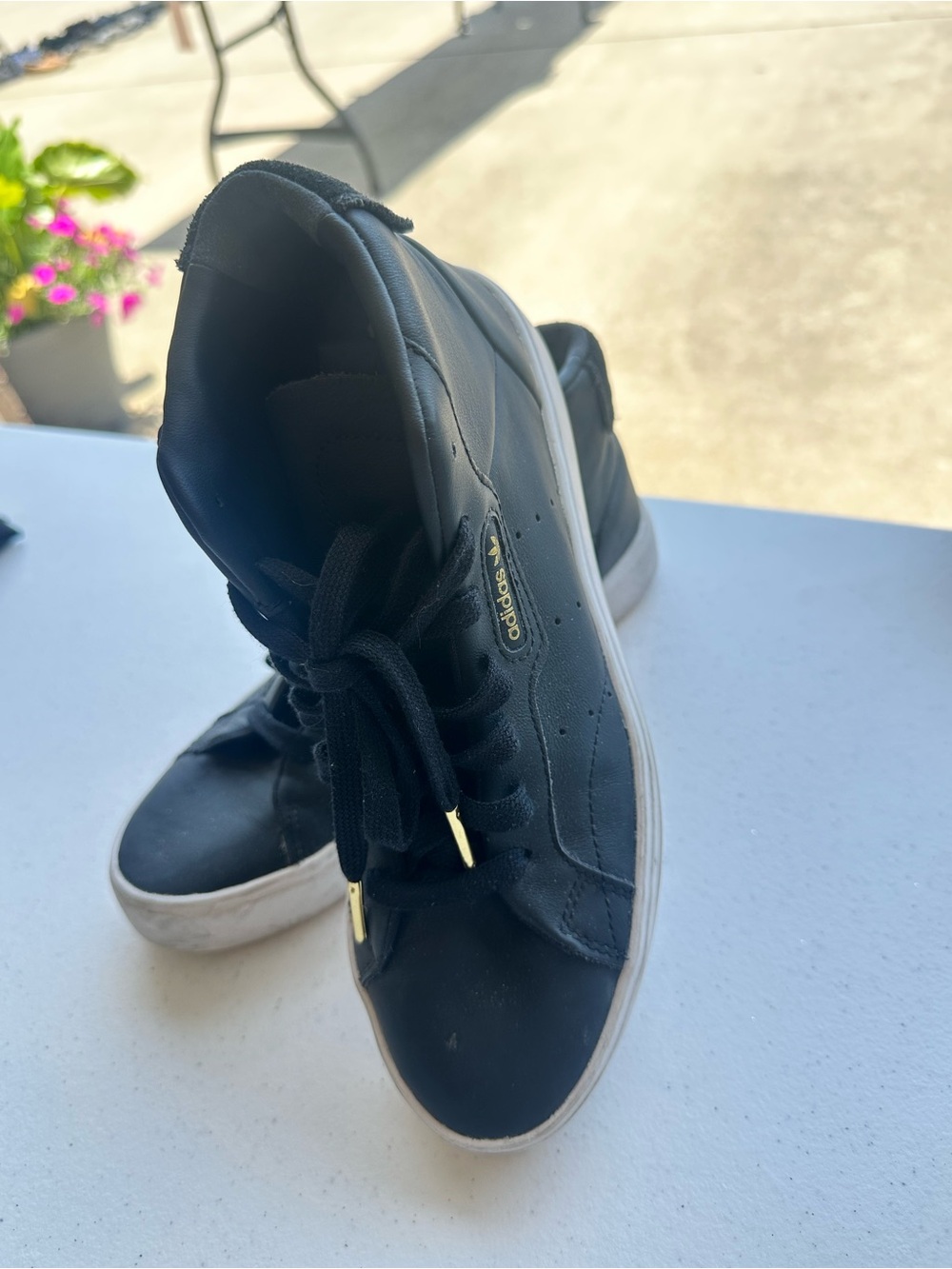 adidas Black Sneakers with White Sole and Gold Accents